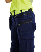 Blaklader Women's Hi-Vis 4-Way-Stretch Trousers 7193 #colour_navy-blue-hi-vis-yellow